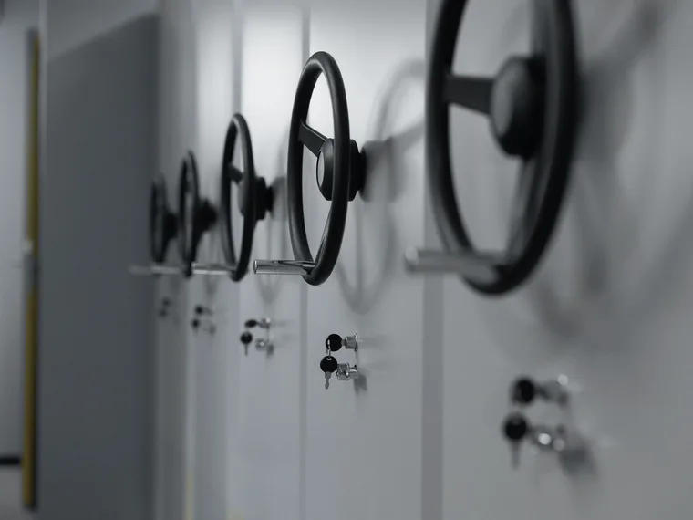 The doors of two safes with their handles and key locks.